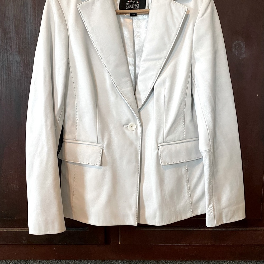 White leather jacket.